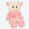 子供部屋の装飾に最適な、柔らかいピンクの巨大な牛のぬいぐるみ - The Plush Company