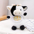 La Compagnie de la Peluche の柔らかくて抱き心地の良い、エレガントな赤ちゃん牛の紳士のぬいぐるみ
